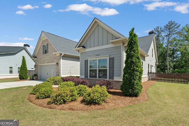 3219 Blackshear Dr, Marietta, GA 30060 - view of side of home with board and batten siding, driveway, brick siding, and a garage