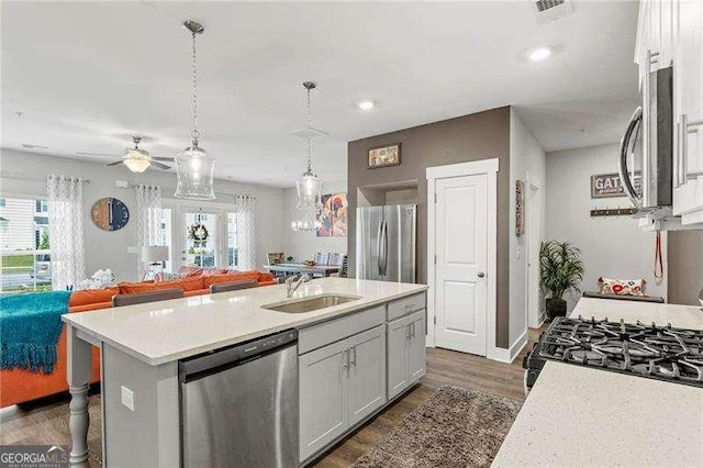 1700 Prospect Way, Conyers, GA 30094 - kitchen with appliances with stainless steel finishes, a sink, plenty of natural light, light countertops, and recessed lighting