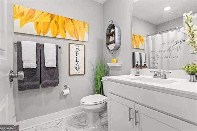 1700 Prospect Way, Conyers, GA 30094 - full bathroom with marble look tiles, toilet, vanity, a shower with shower curtain, and baseboards