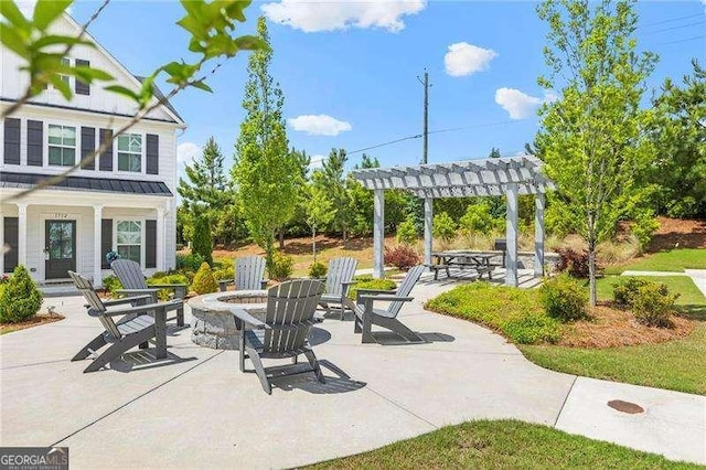 1700 Prospect Way, Conyers, GA 30094 - view of patio / terrace featuring a fire pit and a pergola