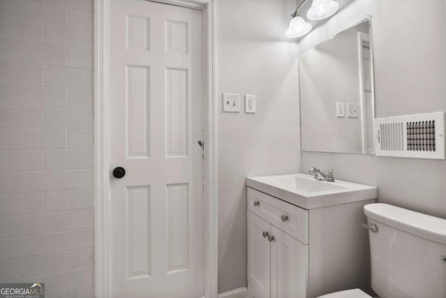 6549 Biscayne Way, Douglasville, GA 30135 - bathroom featuring vanity and toilet
