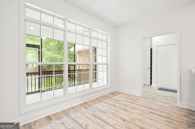 124 Cinder Hill Dr, Brunswick, GA 31523 - spare room featuring baseboards and light wood finished floors