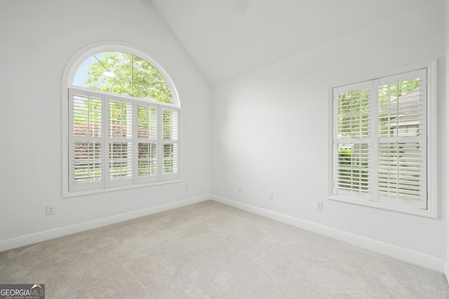 124 Cinder Hill Dr, Brunswick, GA 31523 - carpeted empty room with vaulted ceiling and baseboards