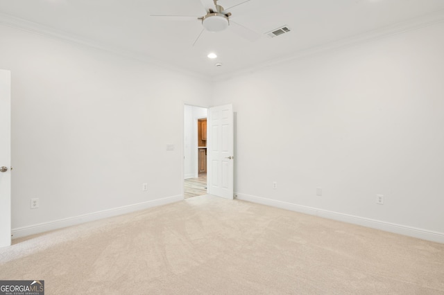 124 Cinder Hill Dr, Brunswick, GA 31523 - spare room featuring crown molding, ceiling fan, light carpet, baseboards, and recessed lighting