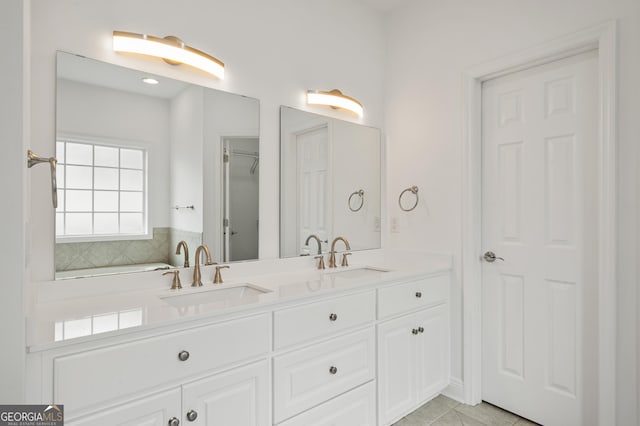 124 Cinder Hill Dr, Brunswick, GA 31523 - full bath with double vanity and tile patterned flooring