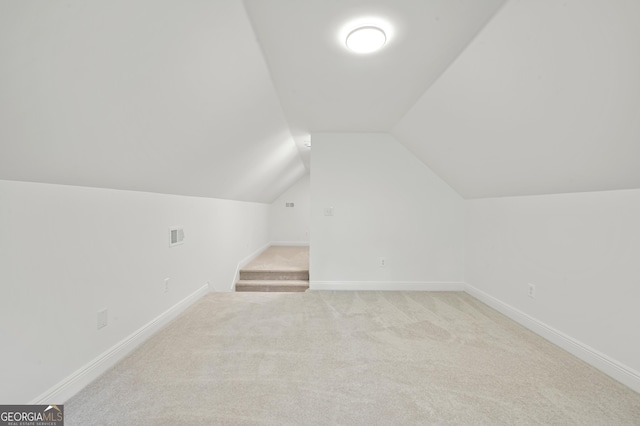 124 Cinder Hill Dr, Brunswick, GA 31523 - bonus room with carpet flooring, lofted ceiling, and baseboards