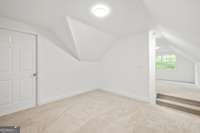 124 Cinder Hill Dr, Brunswick, GA 31523 - bonus room featuring carpet flooring, lofted ceiling, and baseboards