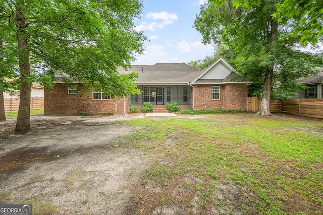 124 Cinder Hill Dr, Brunswick, GA 31523 - back of house featuring brick siding and a shingled roof