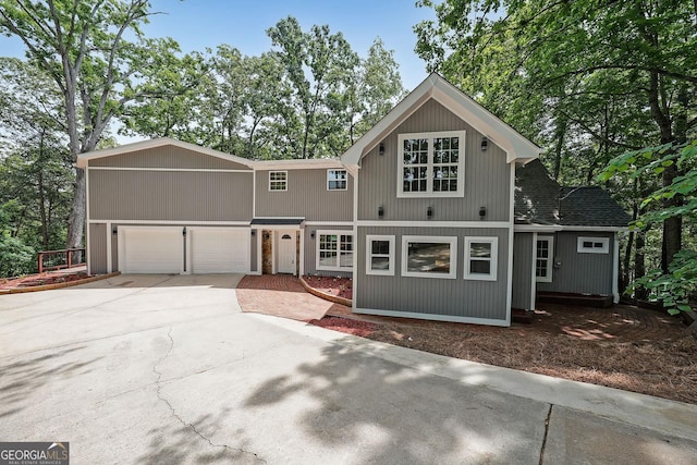 9460 Chestatee Ct, Gainesville, GA 30506 - view of front of home featuring concrete driveway, an attached garage, and roof with shingles