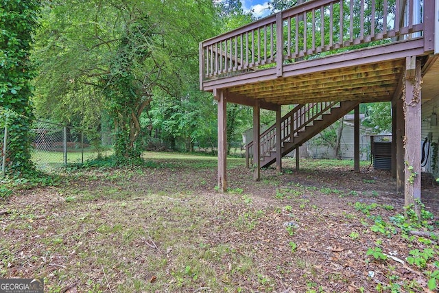 5295 Old Trail Cir, Stone Mountain, GA 30088 - view of yard with a deck and stairway