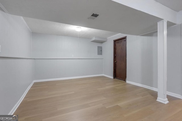 5295 Old Trail Cir, Stone Mountain, GA 30088 - finished basement with electric panel and wood finished floors