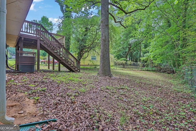 5295 Old Trail Cir, Stone Mountain, GA 30088 - view of yard with stairway and a wooden deck