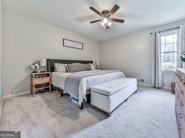 3500 Refuge Rd, Jasper, GA 30143 - carpeted bedroom with a textured ceiling, baseboards, and a ceiling fan