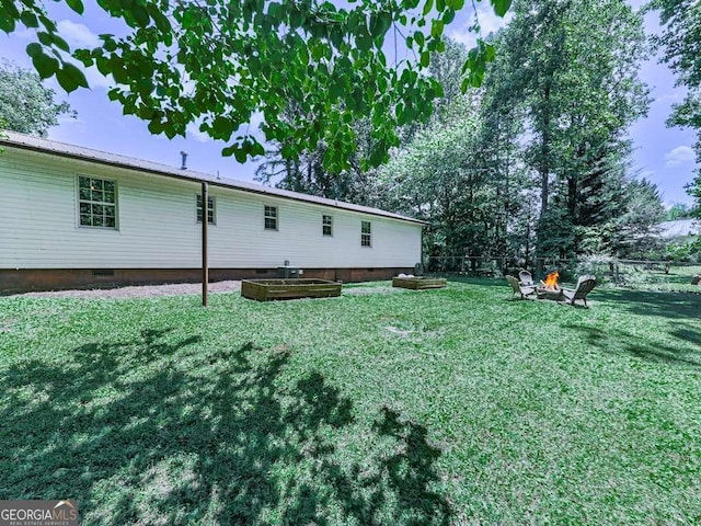 3500 Refuge Rd, Jasper, GA 30143 - rear view of property featuring crawl space and a fire pit