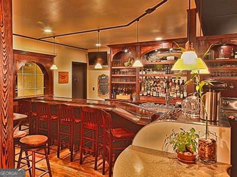 3500 Refuge Rd, Jasper, GA 30143 - indoor dry bar with wood finished floors