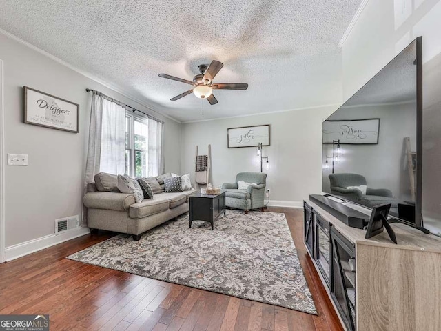3500 Refuge Rd, Jasper, GA 30143 - living area featuring hardwood / wood-style flooring, a textured ceiling, a ceiling fan, baseboards, and crown molding
