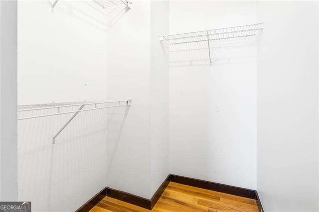 964 Dekalb Ave NE Unit 112, Atlanta, GA 30307 - walk in closet with wood finished floors