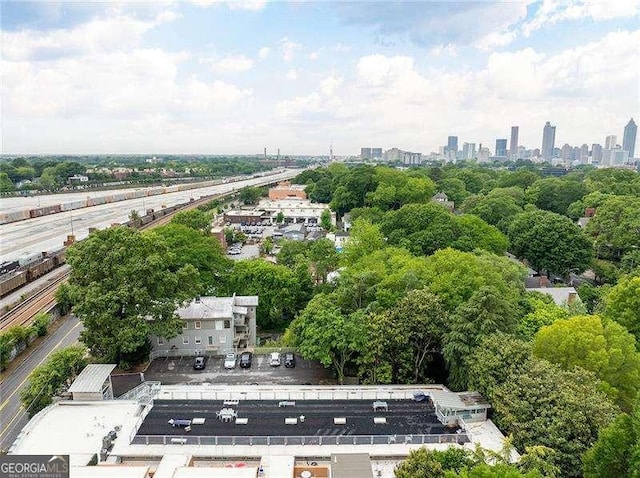 964 Dekalb Ave NE Unit 112, Atlanta, GA 30307 - bird's eye view of a highway, a skyline view, and a tree filled landscape