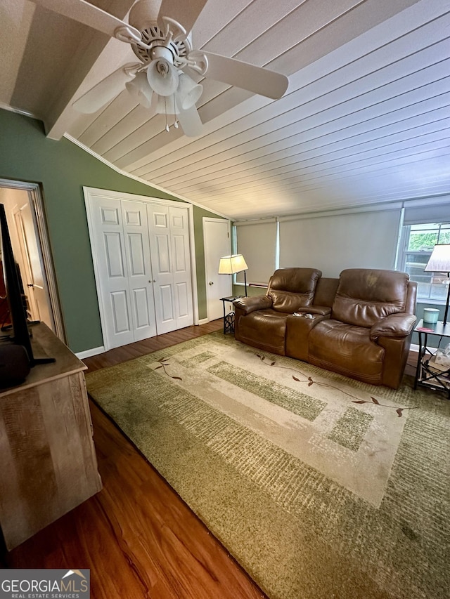 living room with lofted ceiling, ceiling fan, wood finished floors, and wood ceiling