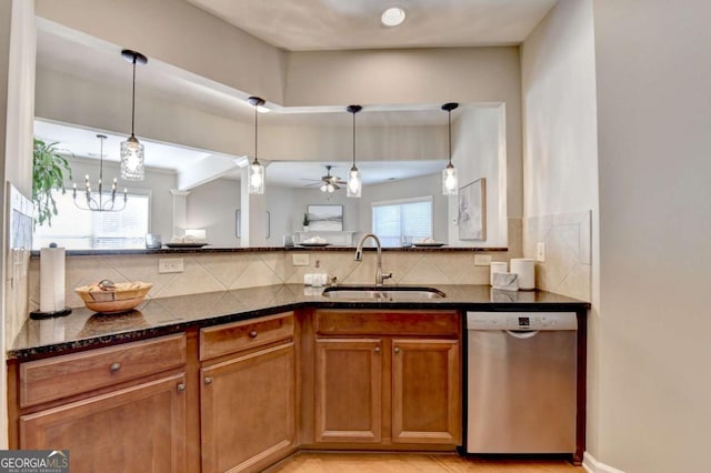 2505 Thackery Ct, Cumming, GA 30041 - kitchen featuring stainless steel dishwasher, a sink, tasteful backsplash, and dark stone counters