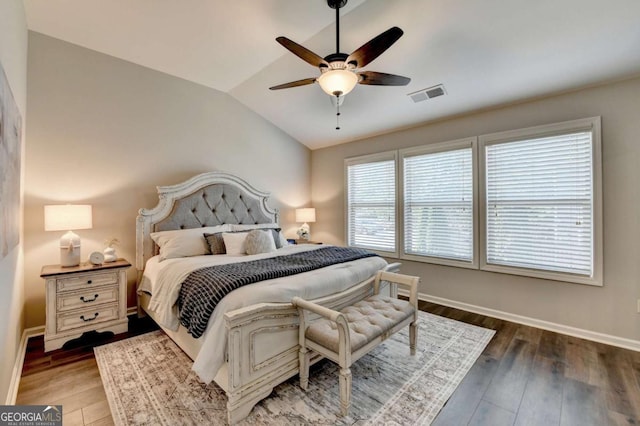 2505 Thackery Ct, Cumming, GA 30041 - bedroom with vaulted ceiling, wood finished floors, baseboards, and a ceiling fan