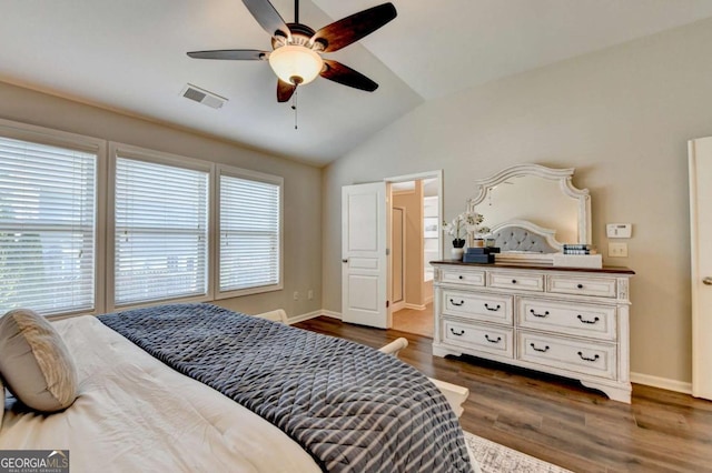 2505 Thackery Ct, Cumming, GA 30041 - bedroom with vaulted ceiling, dark wood-type flooring, baseboards, ceiling fan, and ensuite bathroom