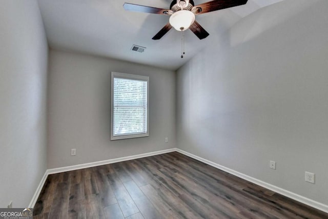 2505 Thackery Ct, Cumming, GA 30041 - spare room featuring dark wood finished floors, baseboards, and ceiling fan
