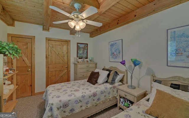 carpeted bedroom with wooden ceiling, beam ceiling, and a ceiling fan