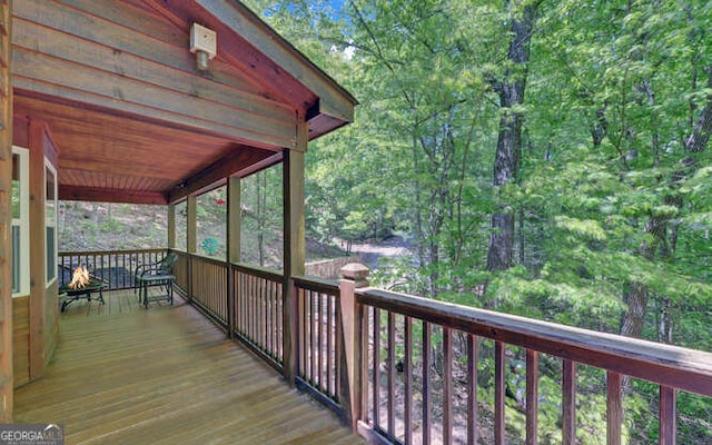 wooden deck featuring covered porch