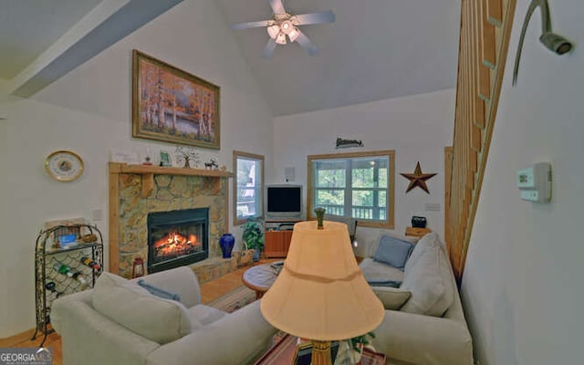 living room with high vaulted ceiling, a stone fireplace, and ceiling fan