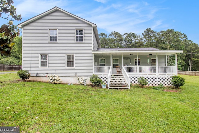 1125 Babbs Mill Rd, Hampton, GA 30228 - view of front of house with covered porch, a front lawn, and stairs