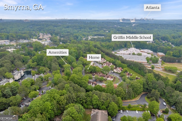 drone / aerial view of a heavily wooded area