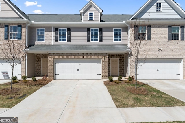 2871 Fareed, Douglasville, GA 30135 - multi unit property with an attached garage, driveway, and brick siding