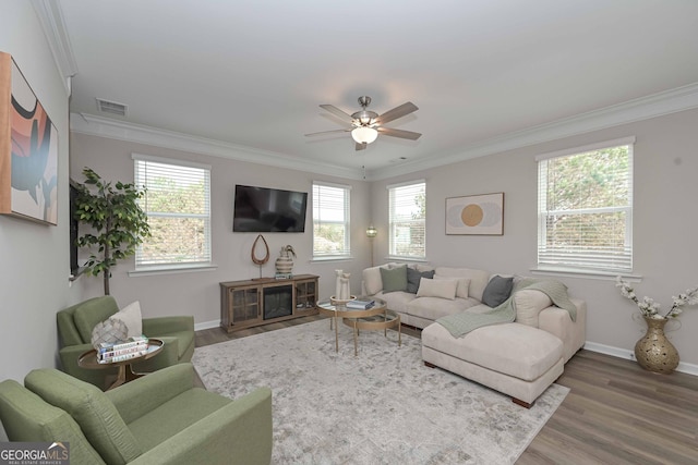 2871 Fareed, Douglasville, GA 30135 - living room with crown molding, wood finished floors, a ceiling fan, and baseboards