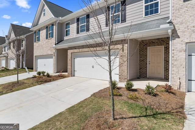 2871 Fareed, Douglasville, GA 30135 - multi unit property with an attached garage, concrete driveway, and brick siding