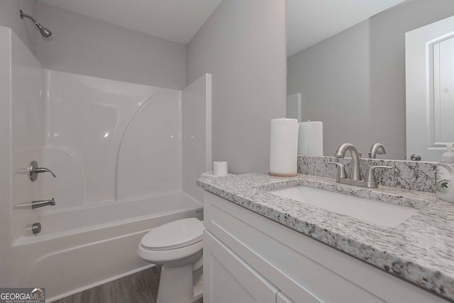 2871 Fareed, Douglasville, GA 30135 - bathroom featuring tub / shower combination, wood finished floors, toilet, and vanity