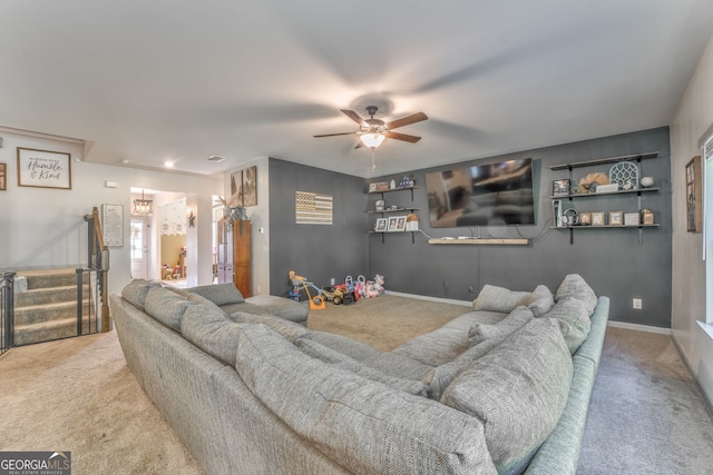 214 Willowbrook Way SE, Calhoun, GA 30701 - living room with carpet floors, ceiling fan, baseboards, and stairway