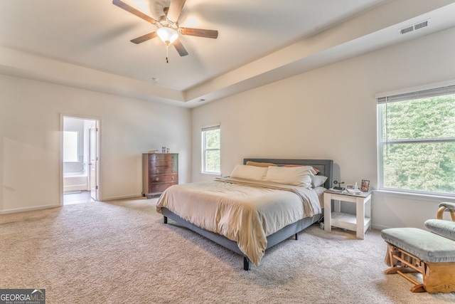 214 Willowbrook Way SE, Calhoun, GA 30701 - carpeted bedroom with a tray ceiling, baseboards, ensuite bath, and a ceiling fan