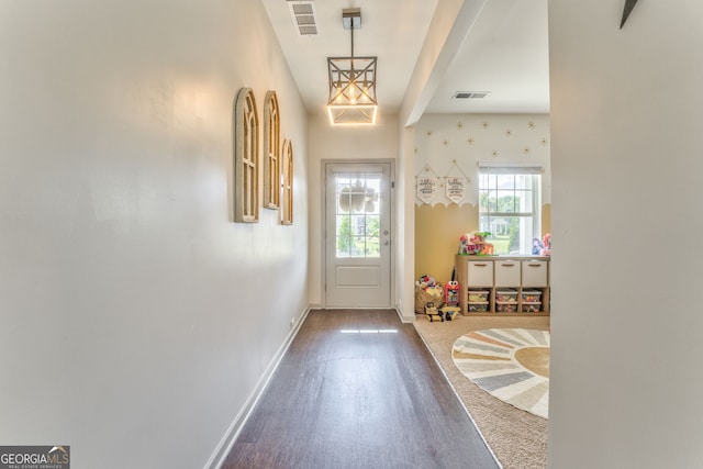 214 Willowbrook Way SE, Calhoun, GA 30701 - doorway featuring baseboards, dark wood finished floors, and beam ceiling