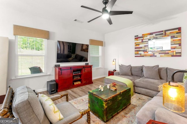 426 Samara Ct, Fairburn, GA 30213 - living room with wood finished floors, a ceiling fan, and baseboards