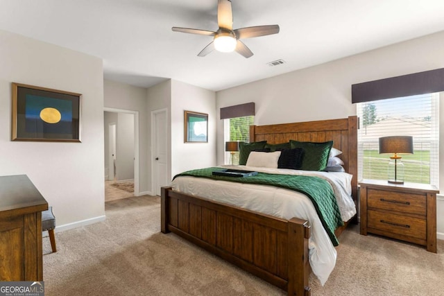 426 Samara Ct, Fairburn, GA 30213 - carpeted bedroom with baseboards and ceiling fan