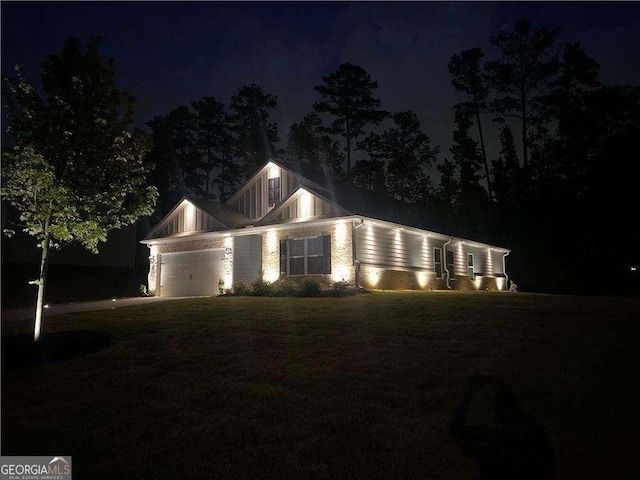 426 Samara Ct, Fairburn, GA 30213 - mid-century home with a garage, a lawn, and driveway