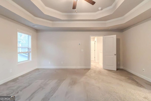 255 Dublin Way, Dallas, GA 30132 - empty room with a raised ceiling, ornamental molding, baseboards, and a ceiling fan