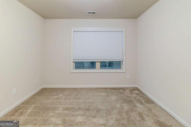 255 Dublin Way, Dallas, GA 30132 - carpeted empty room with baseboards