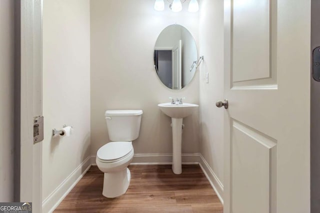 255 Dublin Way, Dallas, GA 30132 - bathroom with toilet and wood finished floors