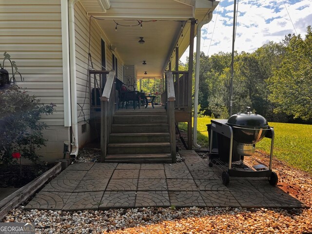 view of patio featuring a porch