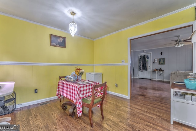 2290 Old Federal Rd, Chatsworth, GA 30705 - dining space featuring wood finished floors, ornamental molding, and a ceiling fan