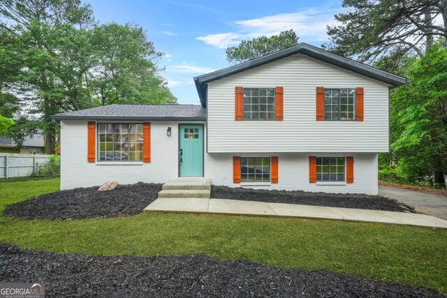 1355 Tucker Woods Dr, Norcross, GA 30093 - tri-level home featuring brick siding