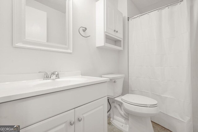 1355 Tucker Woods Dr, Norcross, GA 30093 - full bath with vanity, toilet, and a shower with shower curtain