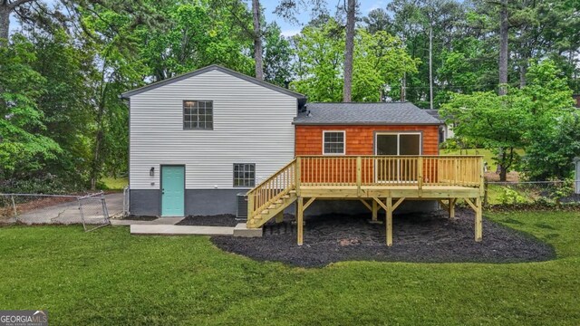 1355 Tucker Woods Dr, Norcross, GA 30093 - back of house featuring a deck, stairway, view of wooded area, and roof with shingles
